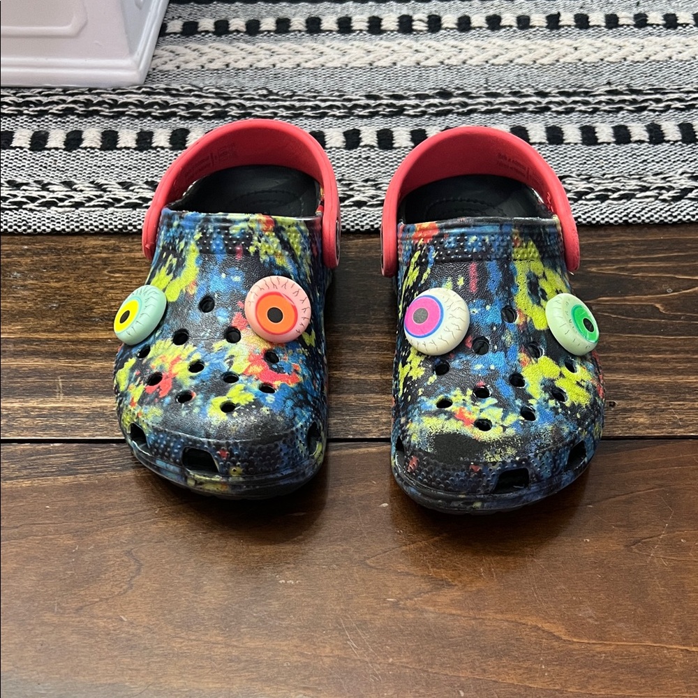 CROCS Kids Sandals in Black, Yellow, and Red with Fun Charms